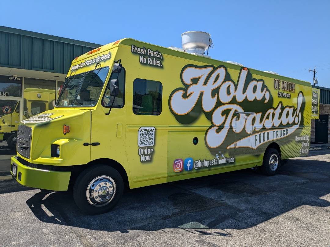 Hola, Pasta! Food Truck A food truck with a full wrap graphic, including logo, social media handles, slogans, and QR code for mobile ordering.